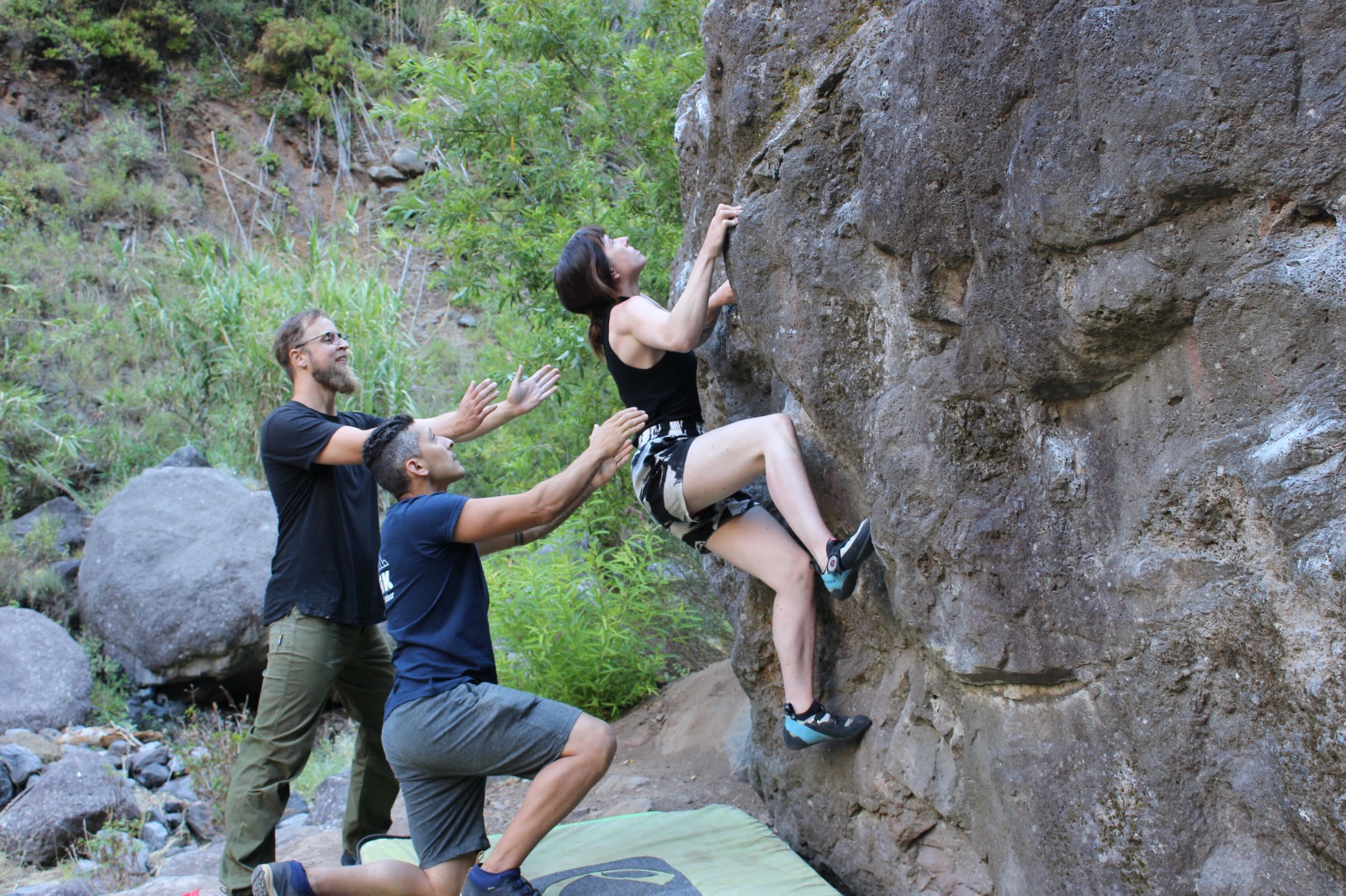 a climber bouldering in one of the boulders in Nun's Valley