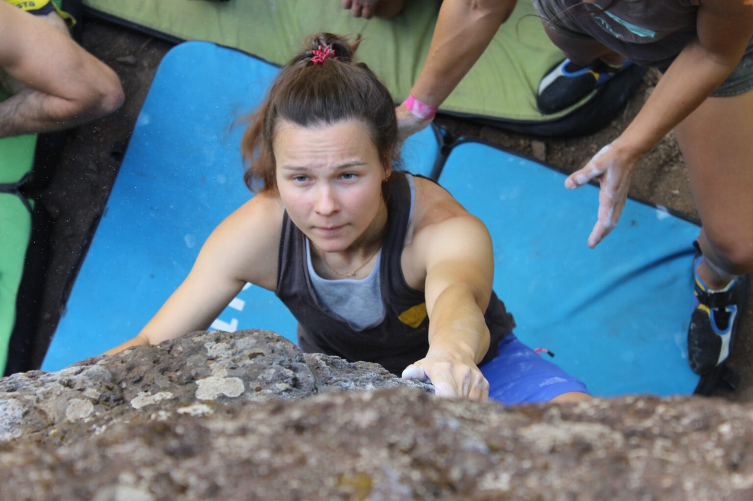 a boulderer trying one of the boulder problems in Nun's valley